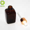 Botella del dropper de cristal del aceite esencial del ámbar cuadrado cosmético vacío de 30ml